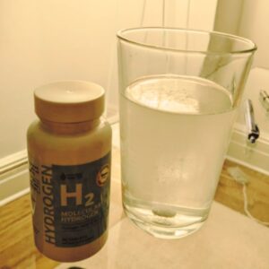 Invigorated Molecular Hydrogen Water Tablets in a glass